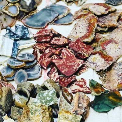 Assortment of stones on a white towel.